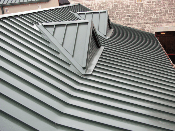A dark green standing seam roof.