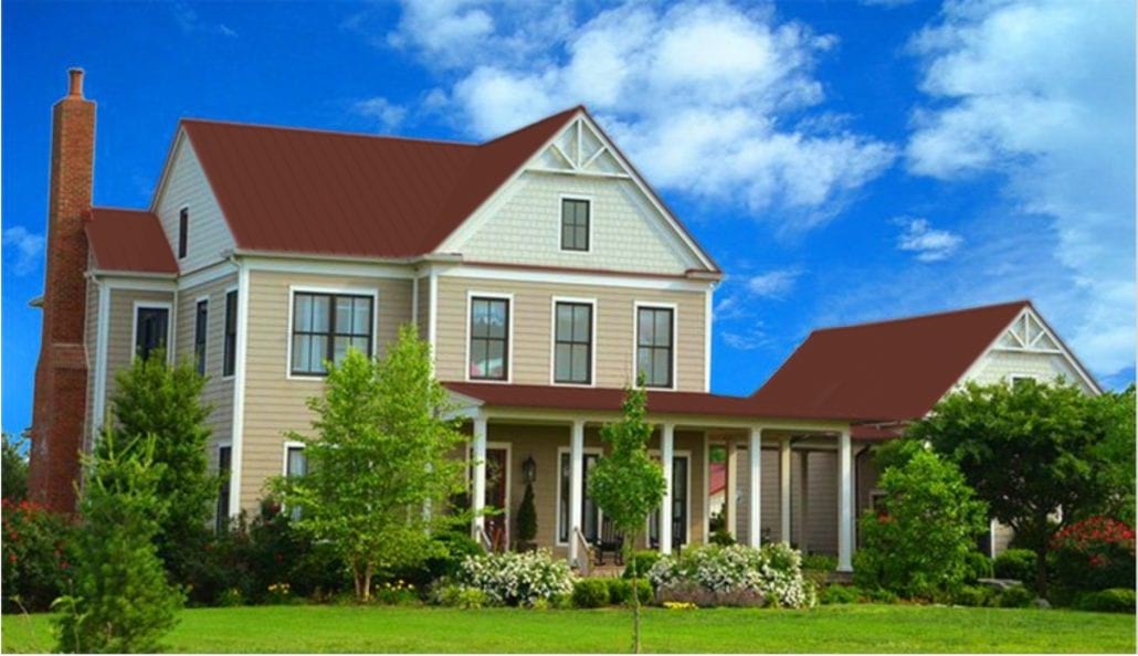 A large 3 story home with brown metal residential roofing.