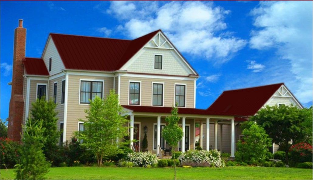 A large 3 story home with burgundy metal residential roofing.