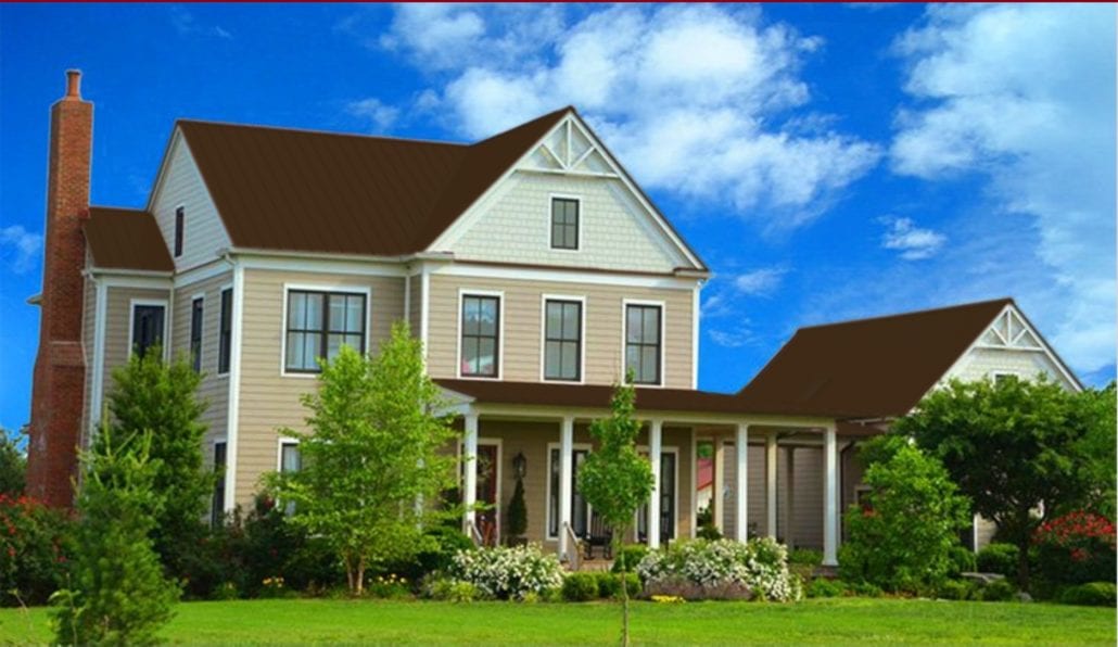 A large 3 story home with gray metal residential roofing.