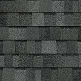 Dark gray asphalt roofing shingles