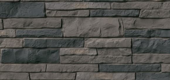 Dark gray TandoStone composite siding without grout.