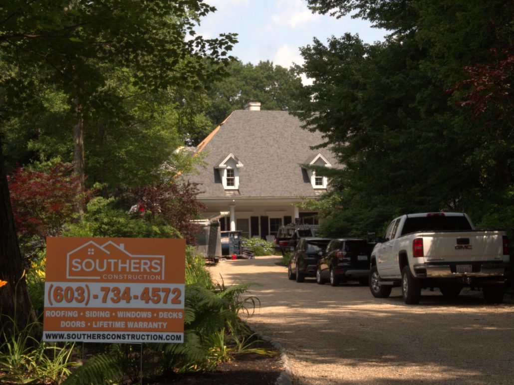 Roofing Project at House in West Newbury Massachusetts with Southers Construction Yard Sign in frame.