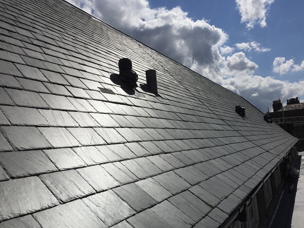 Sunlight reflecting off a slate tile roof.