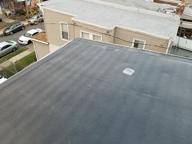 The overview of a rubber residential roof.