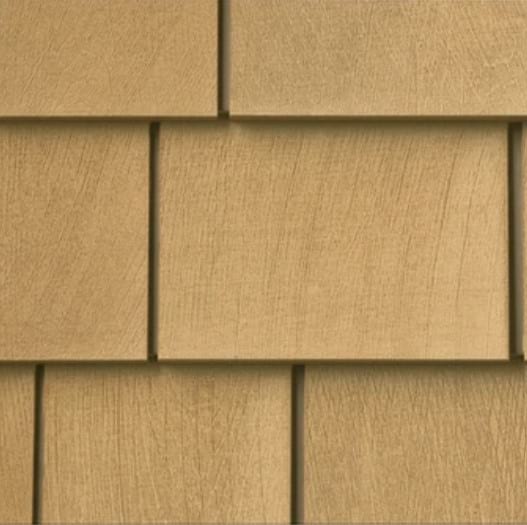 Tan shake siding panels.