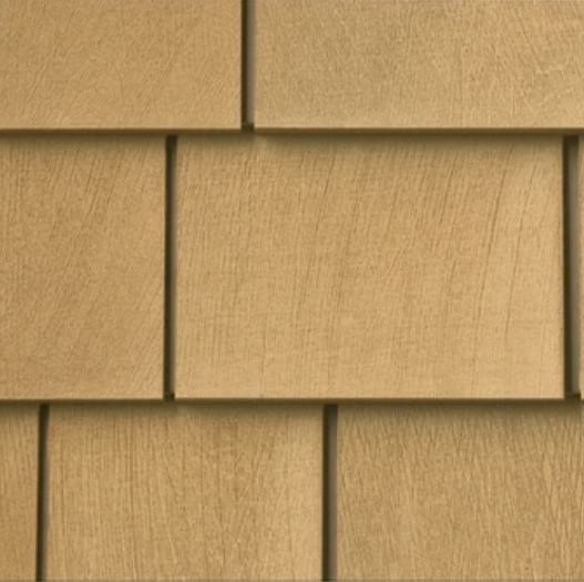 Tan shake siding panels.