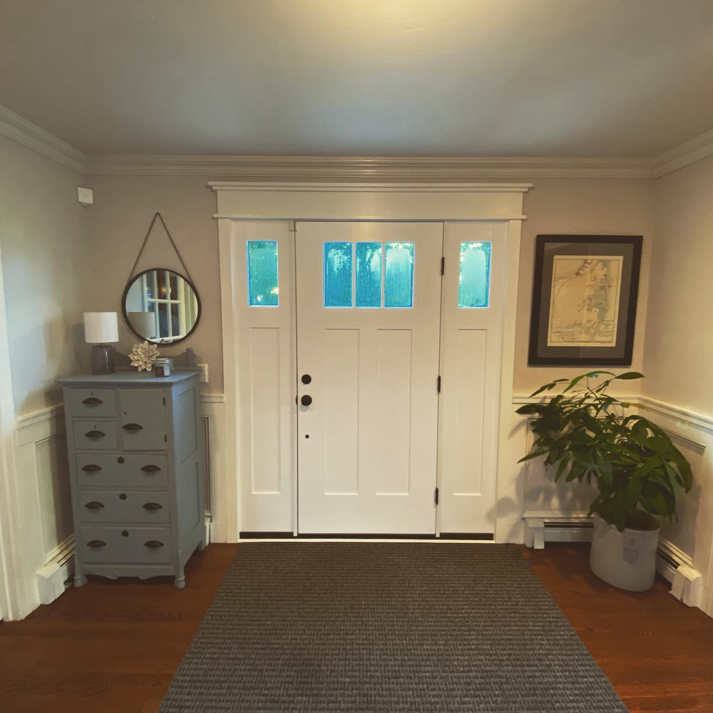A white fiberglass entry door from the interior of the home.