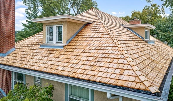 A home with cedar shake shingles as a specialty roof.