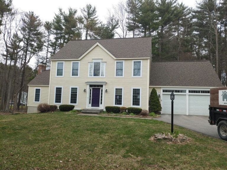 A 2 story home in Durham, NH. with newly installed windows.