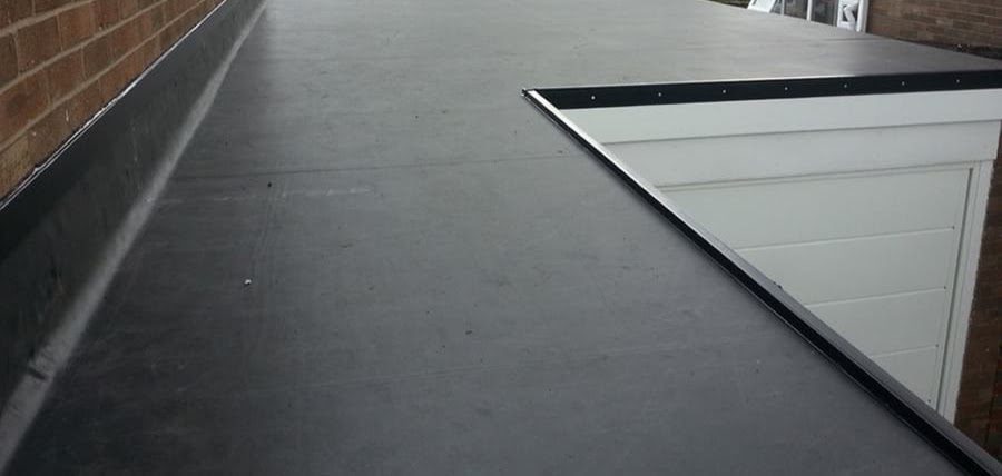 A flat black rubber roof.