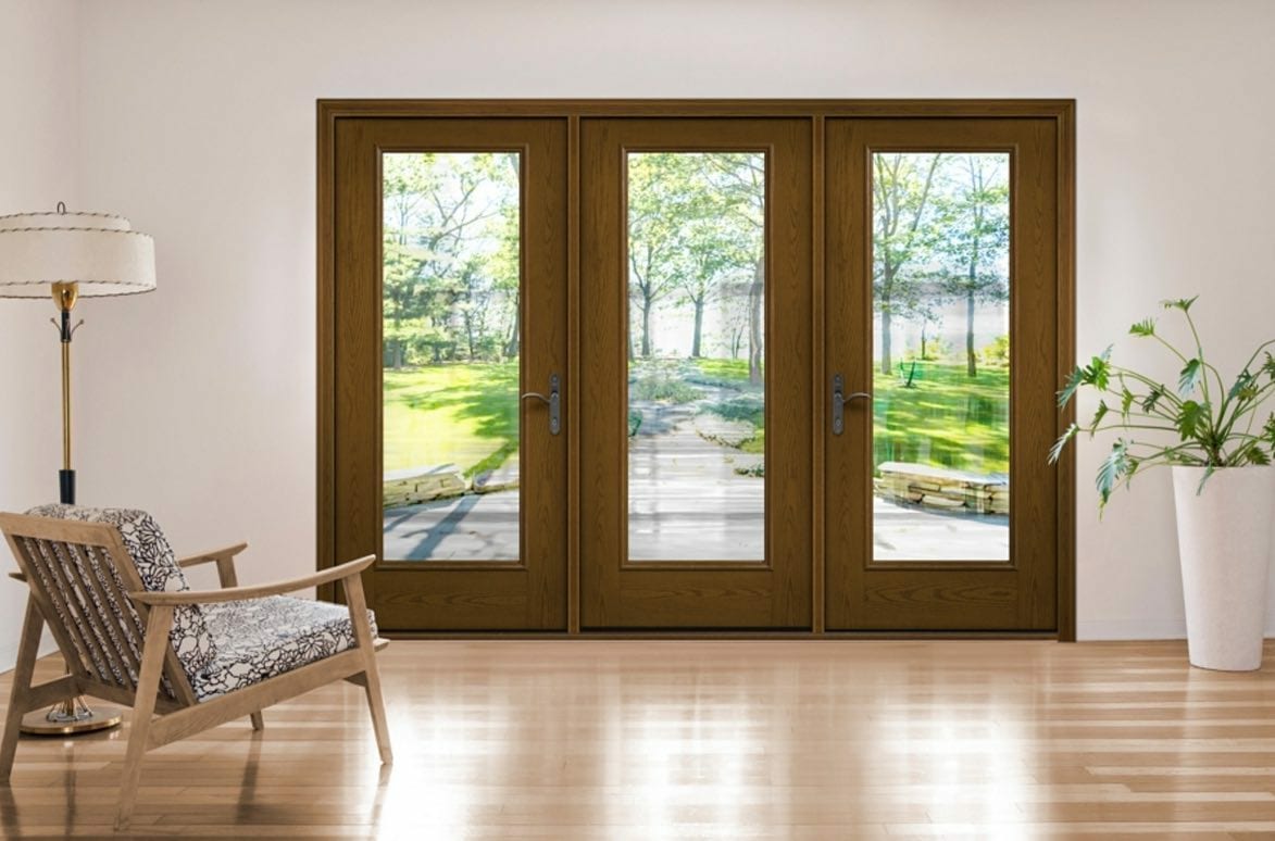 Wooden hinged patio doors from the interior of the home.