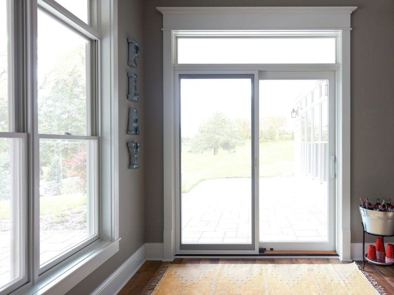 Sliding patio doors on the interior of a home leading to a patio.