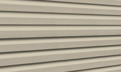 Light beige Premium Pointe vinyl siding panels.