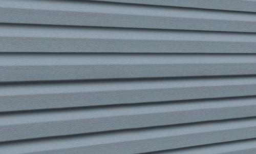 Light blue Premium Pointe vinyl siding panels.